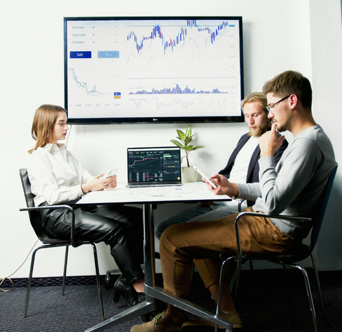 Business professionals analyzing logistics data